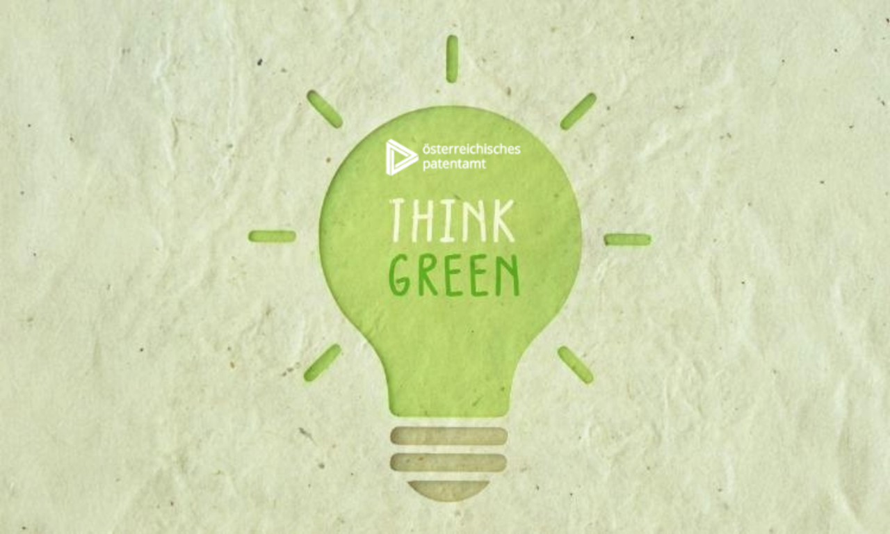 ein hellgrüner Pappkarton mit dem Ausschnitt einer Glühbirne und der Aufschrift Think Green und dem Logo des Österreichischen Patentamtes